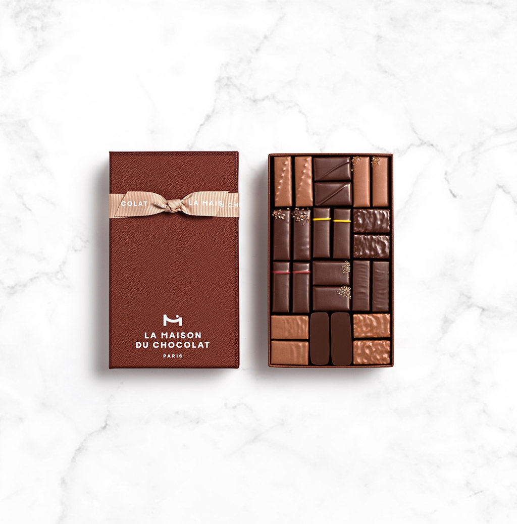 Maison Gift Box Dark and Milk 24 chocolates on background marble 