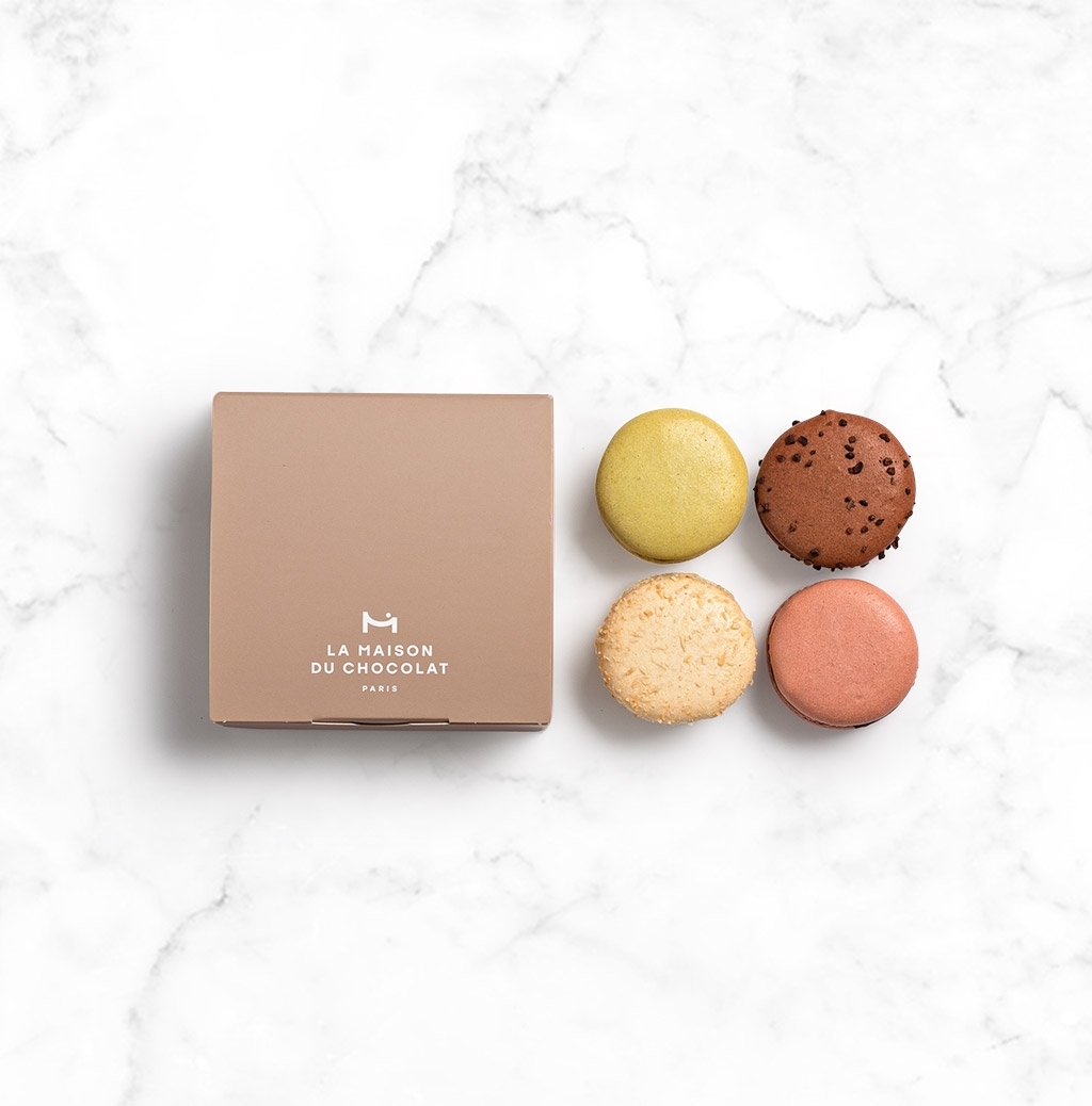 Macarons Case 4 pieces on marble  background